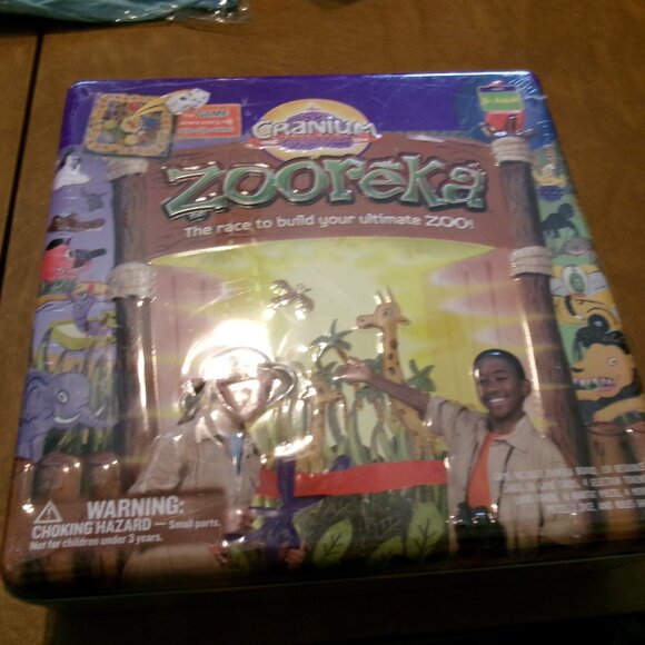 Cranium - Zooreka -The Race to Build Your Ultimate Zoo Square Tin Edition New - Picture 1 of 3